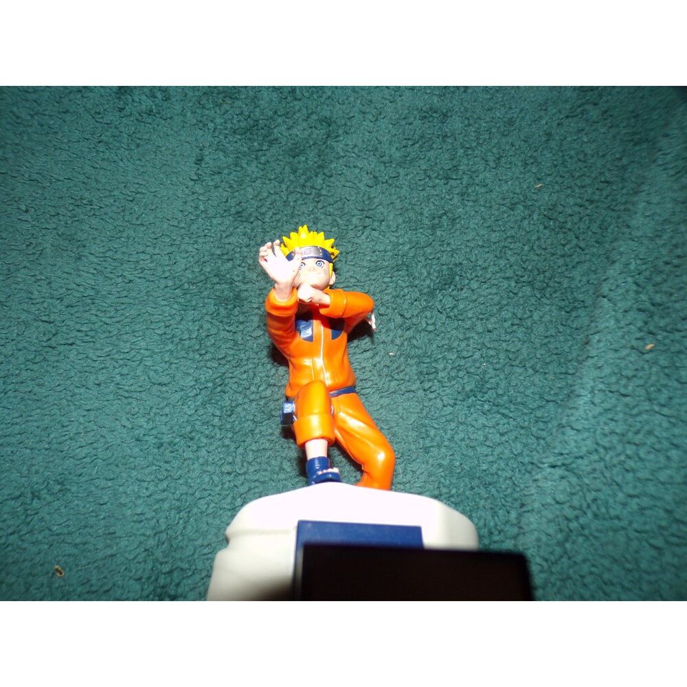 Naruto Uzumaki action figure on base